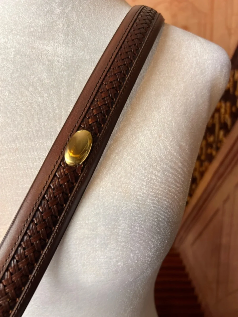 Izod Unique vintage genuine leather belt features a classic brown leather strap